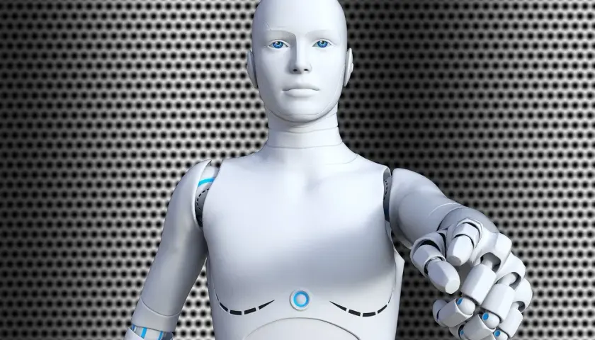 Biały robot z niebieskimi oczami wyciąga dłoń. Czy to przyszłość, co to jest ros?